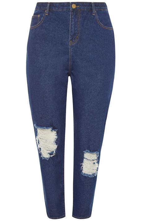 dark blue ripped boyfriend jeans.